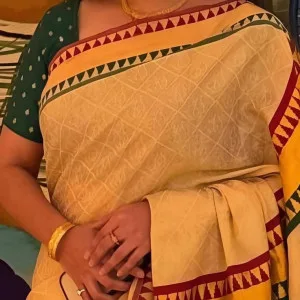 Charming Desi Aunty in Traditional Yellow Saree