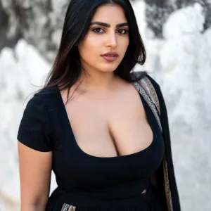 Busty Desi Beauty Poses Seductively