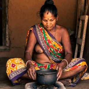 Mature Indian Aunty Cooking in Traditional Attire