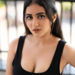 Enchanting Indian Beauty in Revealing Black Top