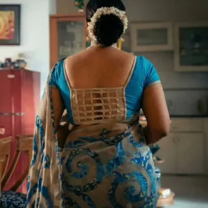 Mature Indian aunty in beautiful traditional saree posing elegantly