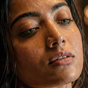 Indian bhabhi with dewy skin and wet hair posing seductively