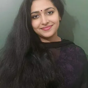 Radiant Desi Beauty in Traditional Black Attire